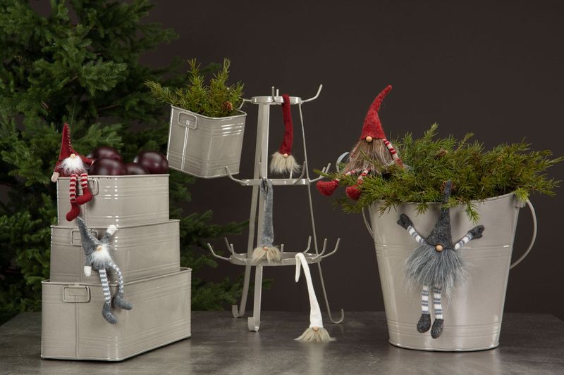 Nisse med magnet, sittende